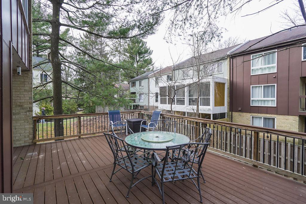 11041 Saffold Way Reston, VA 20190 - Photo 41 of 44 a view of a chair and table on the deck