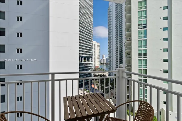 a view of balcony with wooden floor