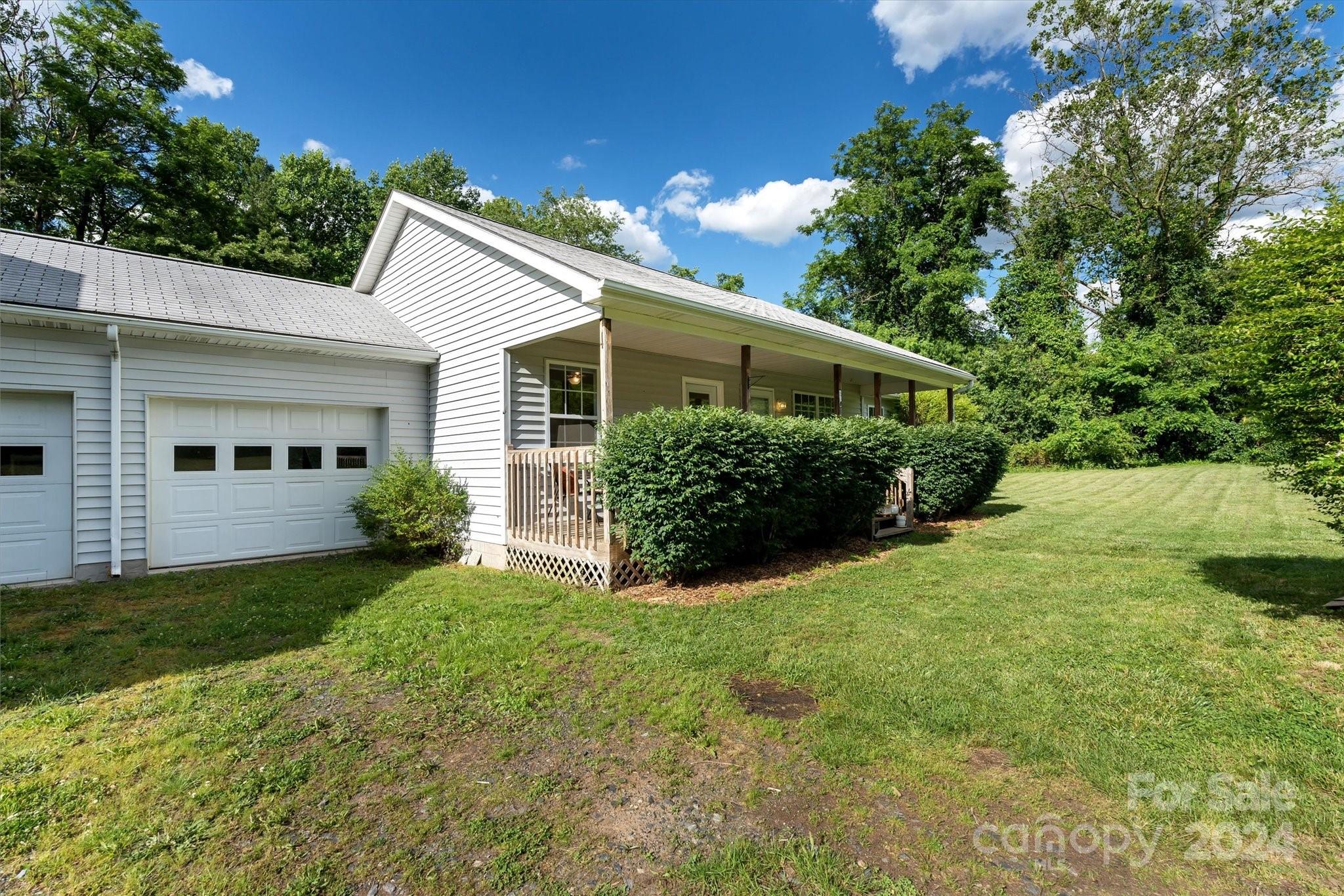 634 Dillingham Road, Unit B Barnardsville, NC 28709 - Photo 1 of 32 a view of a house with a yard