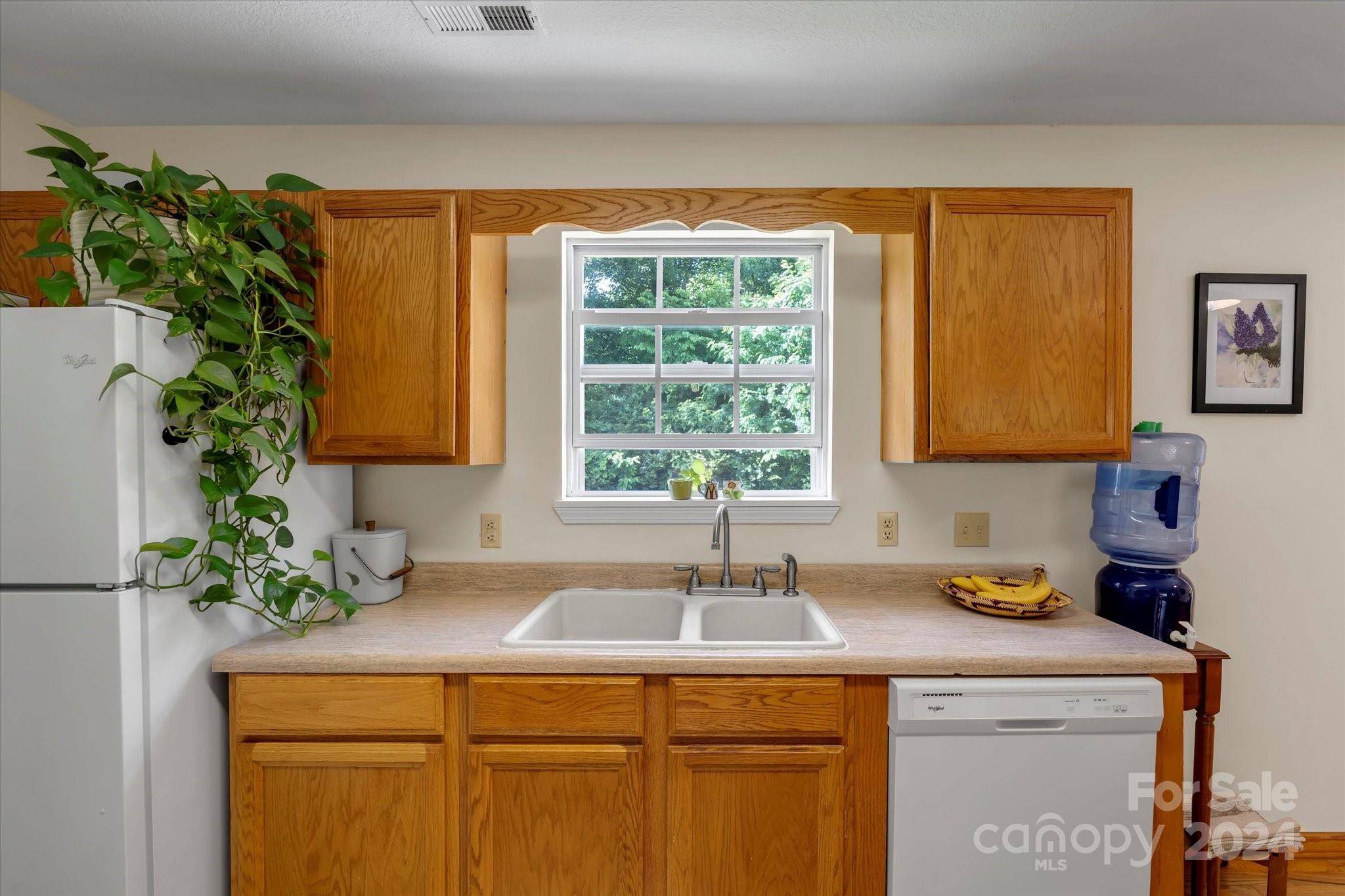 634 Dillingham Road, Unit B Barnardsville, NC 28709 - Photo 18 of 32 a kitchen with a sink and a window