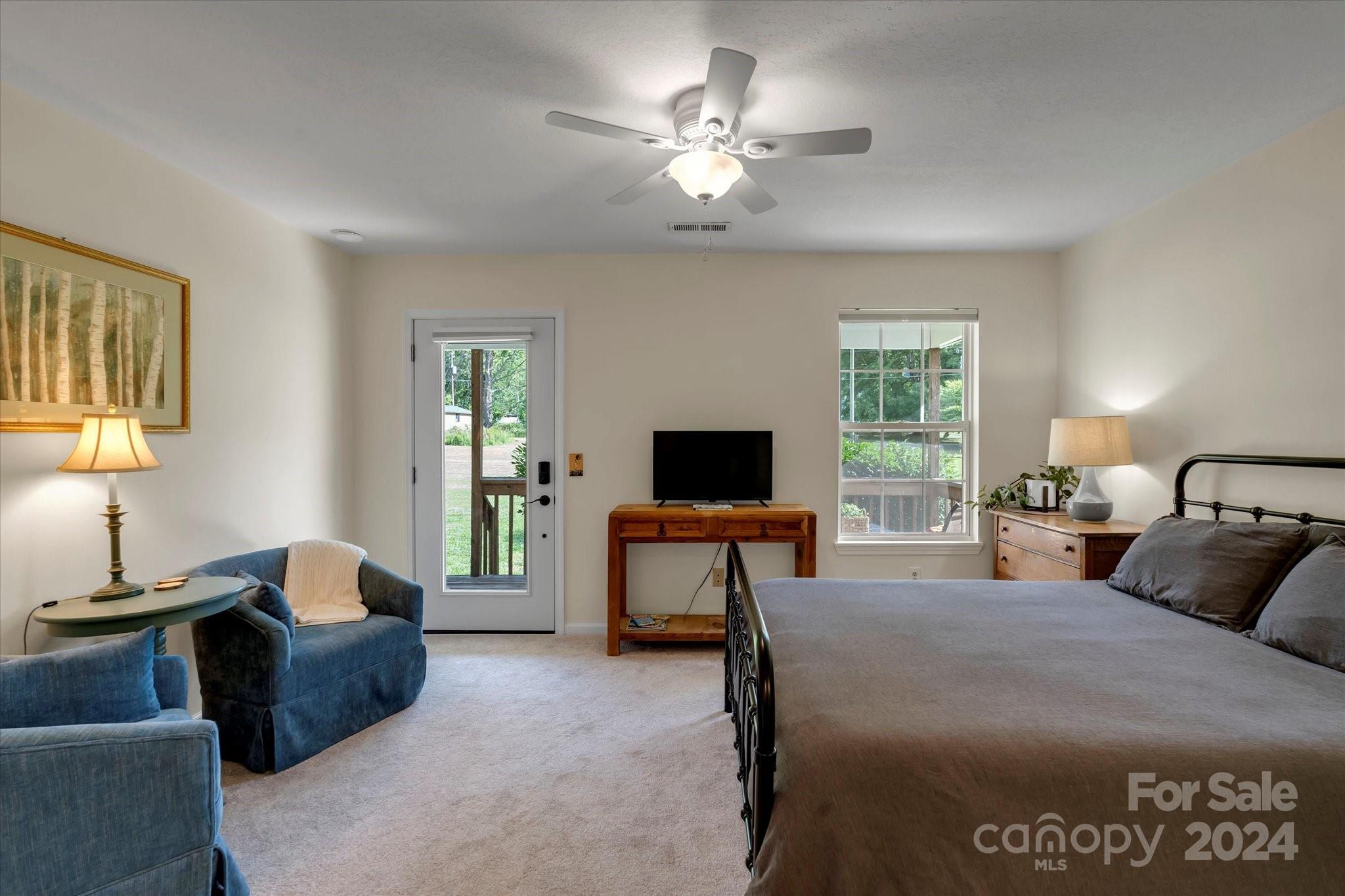 634 Dillingham Road, Unit B Barnardsville, NC 28709 - Photo 21 of 32 a bedroom with a bed and window