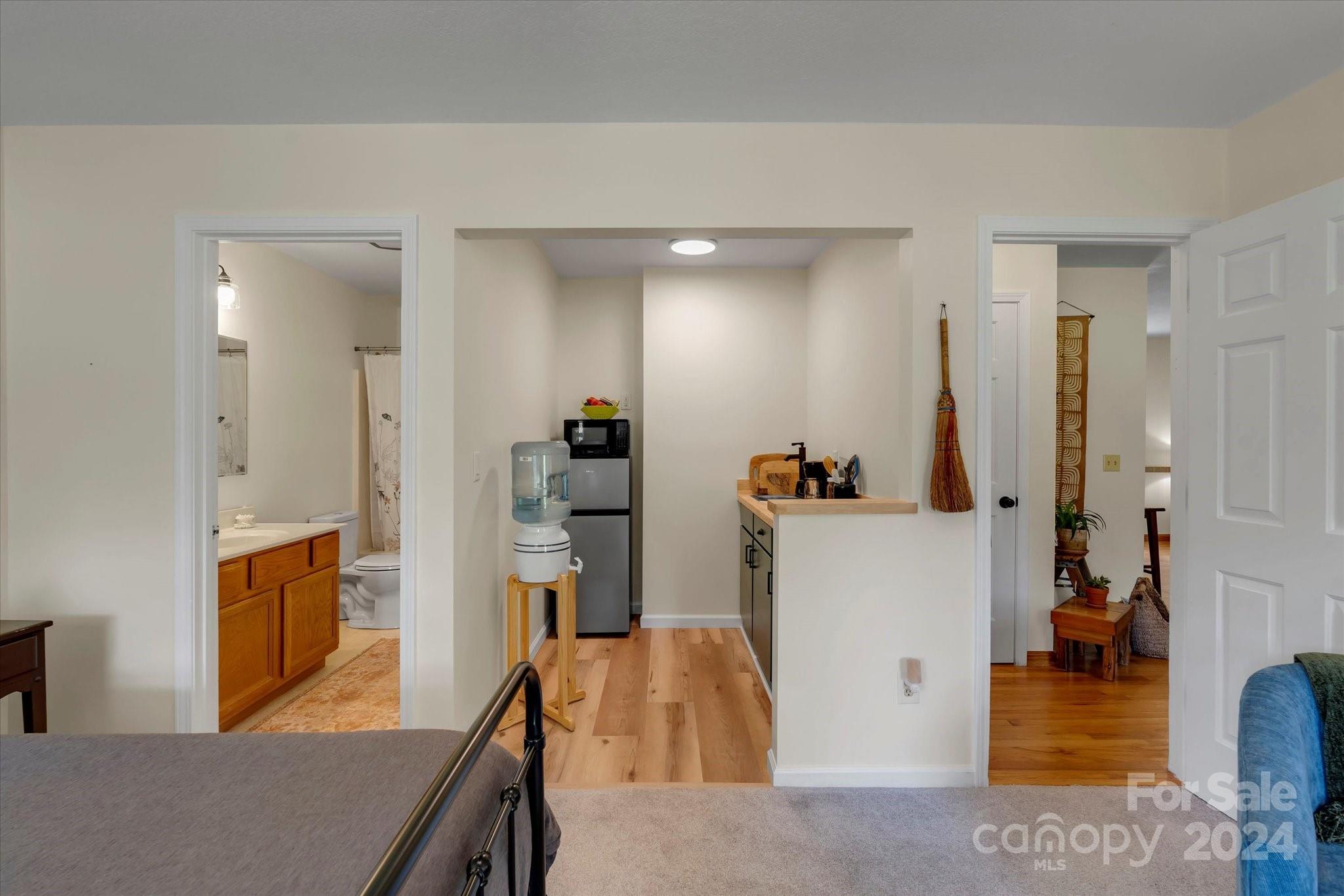 634 Dillingham Road, Unit B Barnardsville, NC 28709 - Photo 23 of 32 a view of kitchen with furniture and wooden floor