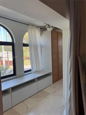 a view of room with window and doors