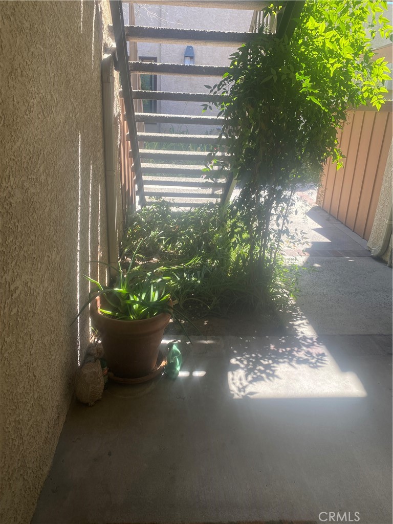 15155 Sherman Way, Unit 14 Van Nuys, CA 91405 - Photo 15 of 36 a view of a flower in a yard