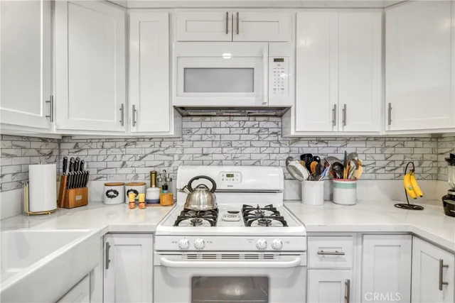 a bedroom with bed and window