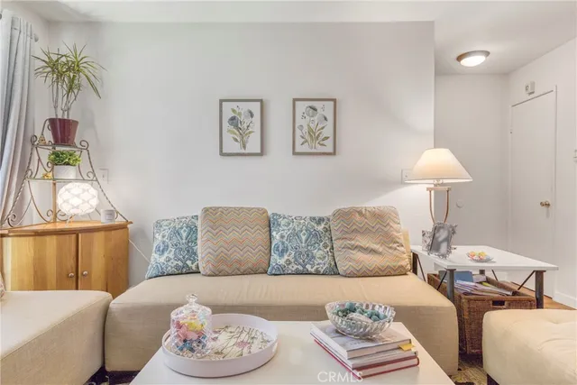 an aerial view of a fireplace with chairs