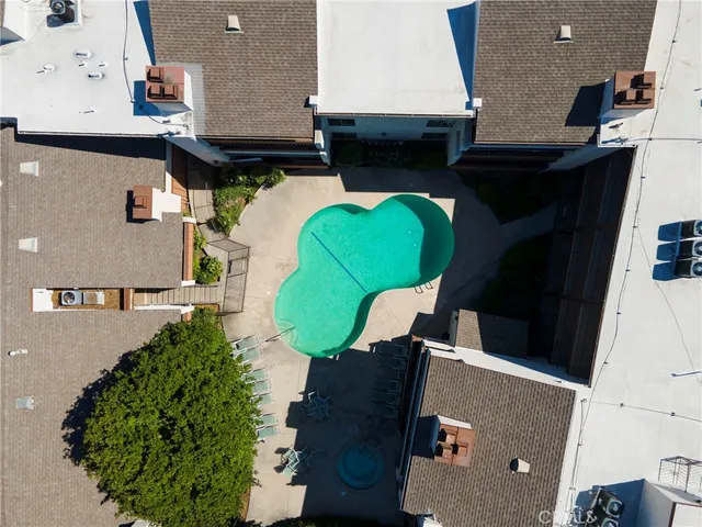 a view of a house with swimming pool