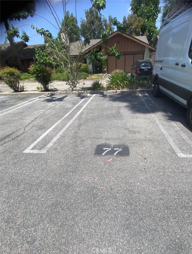 15155 Sherman Way, Unit 14 Van Nuys, CA 91405 - Photo 31 of 36 front view of a house with a street