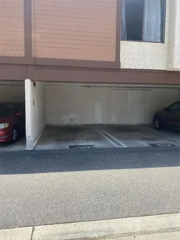 a view of street with parked cars