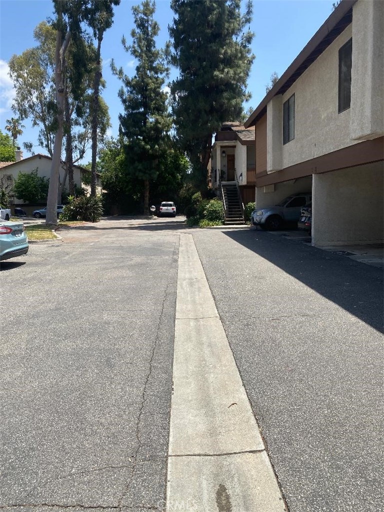 15155 Sherman Way, Unit 14 Van Nuys, CA 91405 - Photo 33 of 36 a view of a street with houses