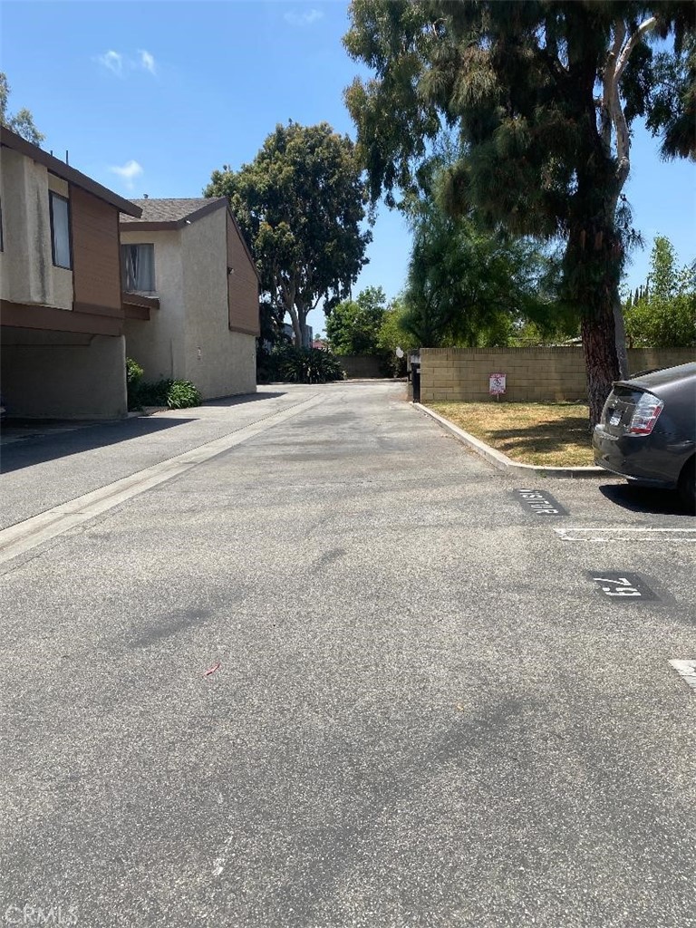 15155 Sherman Way, Unit 14 Van Nuys, CA 91405 - Photo 34 of 36 a view of street with parked cars