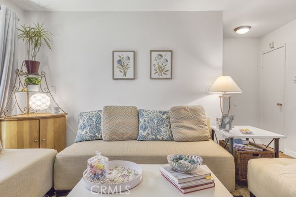 15155 Sherman Way, Unit 14 Van Nuys, CA 91405 - Photo 8 of 36 a living room with furniture and a window