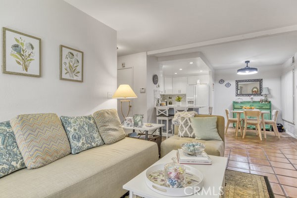 15155 Sherman Way, Unit 14 Van Nuys, CA 91405 - Photo 9 of 36 a living room with furniture and wooden floor