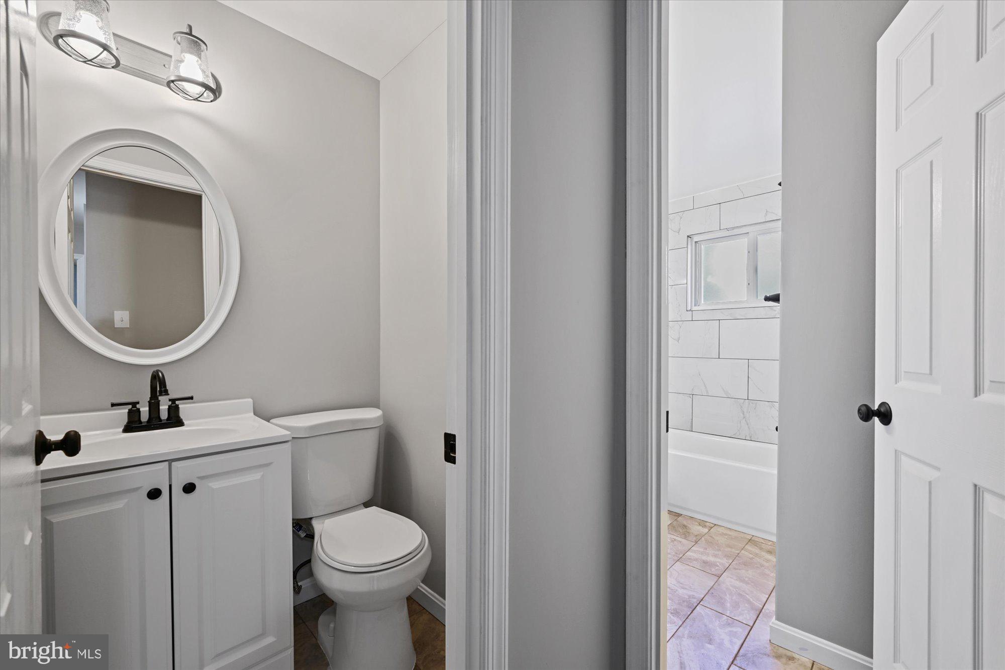 6807 Barnett Road Baltimore, MD 21239 - Photo 13 of 24 Updated bathrooms