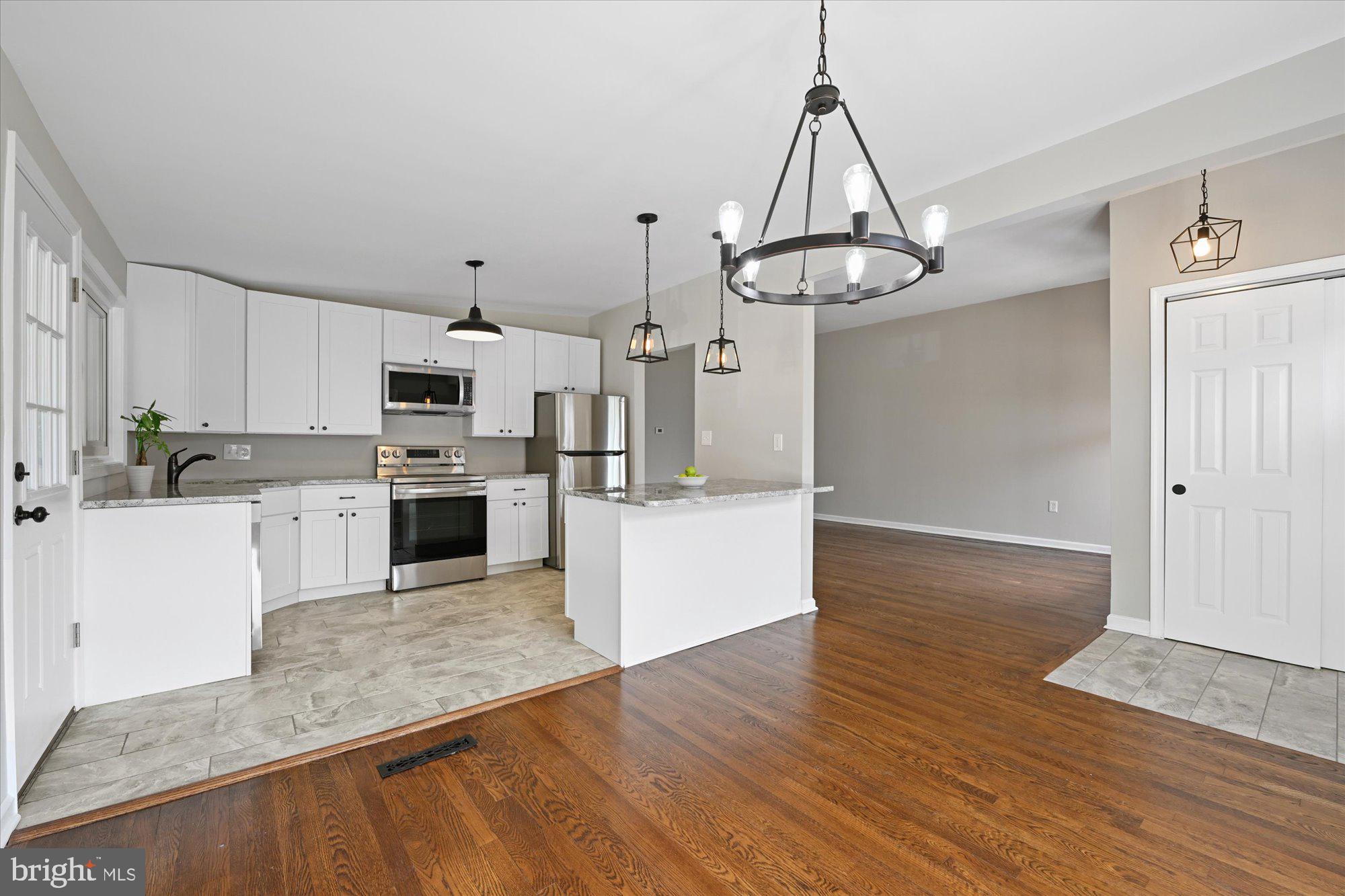 6807 Barnett Road Baltimore, MD 21239 - Photo 6 of 24 Hardwood floors throughout!