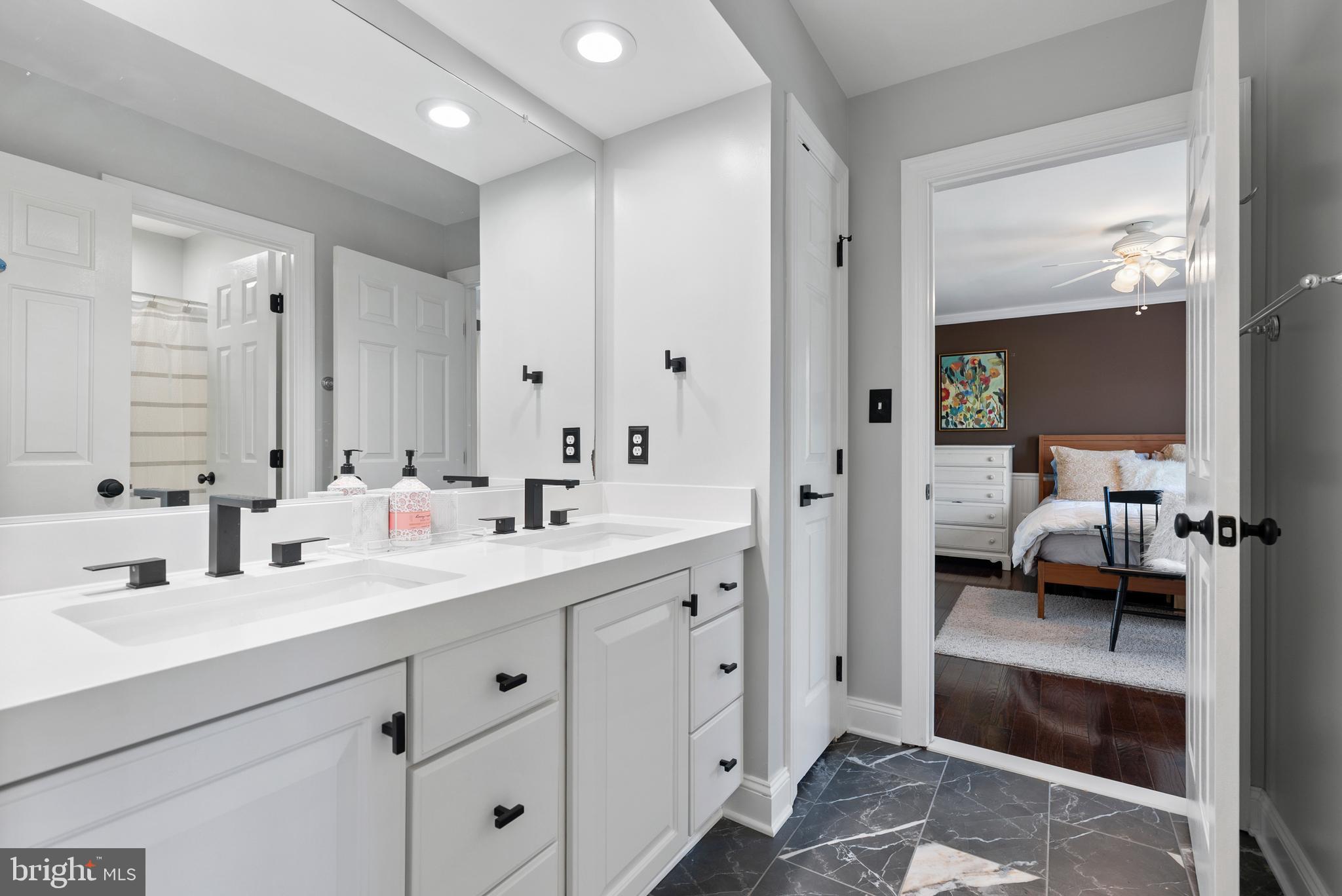7 Redtree Lane Reisterstown, MD 21136 - Photo 44 of 56 a en suite bathroom with double sink and mirrors