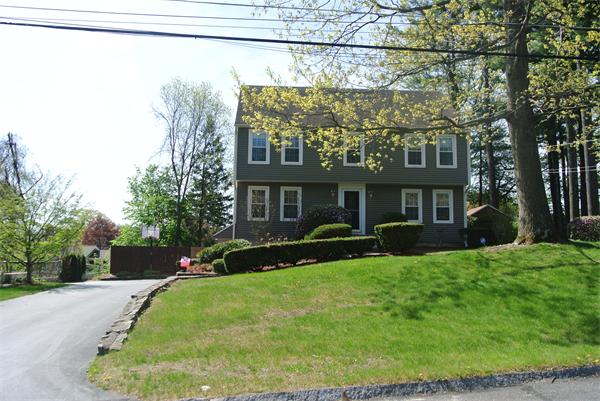 20 Larson Road Milford, MA 01757 - Photo 13 of 13 a front view of a house with a yard and trees