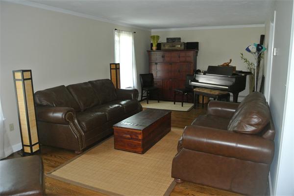 20 Larson Road Milford, MA 01757 - Photo 2 of 13 a living room with furniture