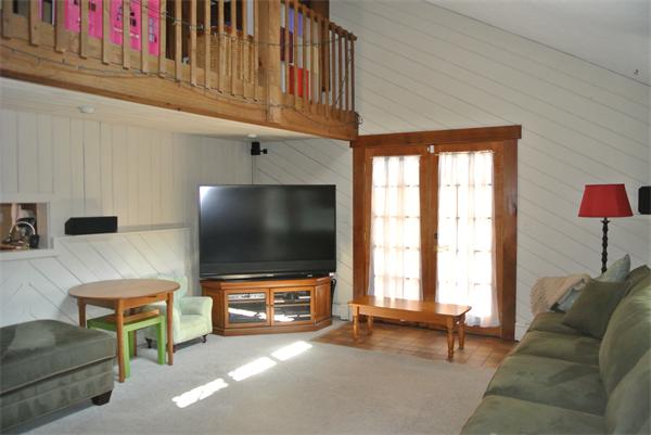 20 Larson Road Milford, MA 01757 - Photo 6 of 13 a living room with furniture and a flat screen tv