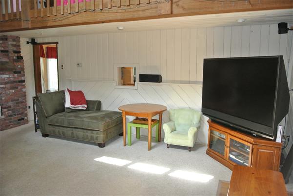 20 Larson Road Milford, MA 01757 - Photo 7 of 13 a living room with furniture and a flat screen tv
