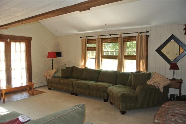 20 Larson Road Milford, MA 01757 - Photo 8 of 13 a living room with furniture and a large window