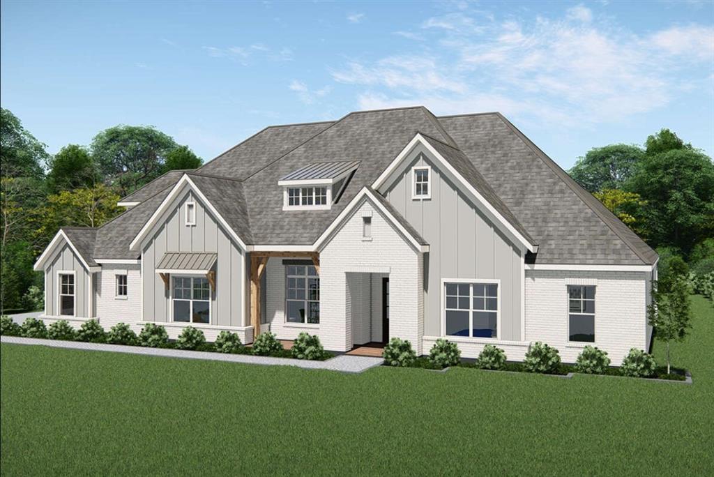 3710 Castle Drive Rowlett, TX 75089 - Photo 12 of 17 View of front of house featuring board and batten siding, roof with shingles, and a front lawn