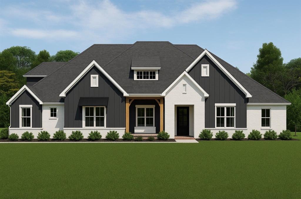 3710 Castle Drive Rowlett, TX 75089 - Photo 2 of 17 View of front of house with board and batten siding, covered porch, and a front lawn