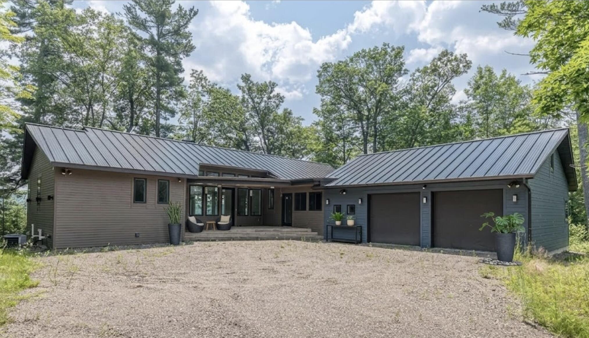 Additional Two-Car Detached Garage with extra Hobby/Workshop.