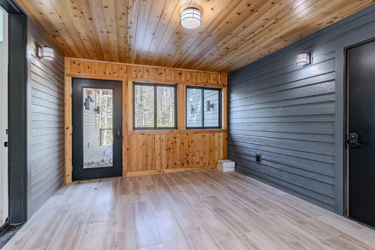 8445 Steele Road Cassian, WI 54529 - Photo 28 of 96 Breezeway leads to Private Patio