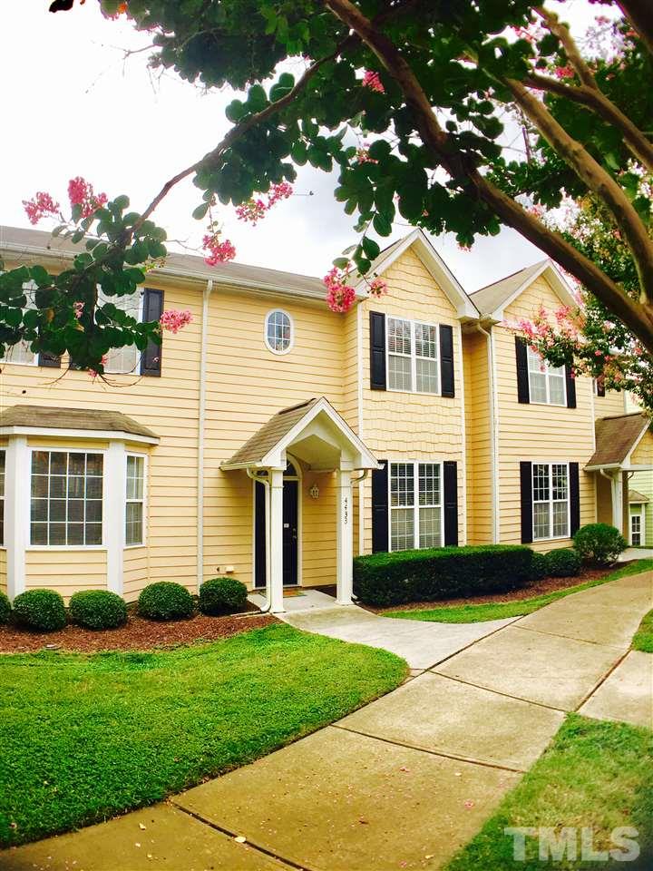 4433 Moss Garden Path Raleigh, NC 27616 - Photo 2 of 20 a front view of a house with a garden
