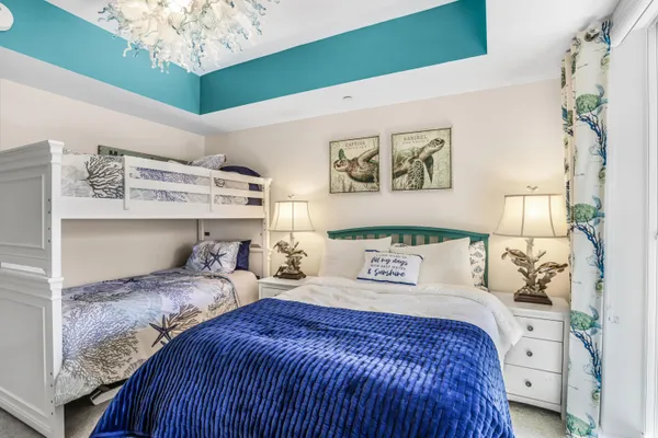 a bedroom with bed and a window