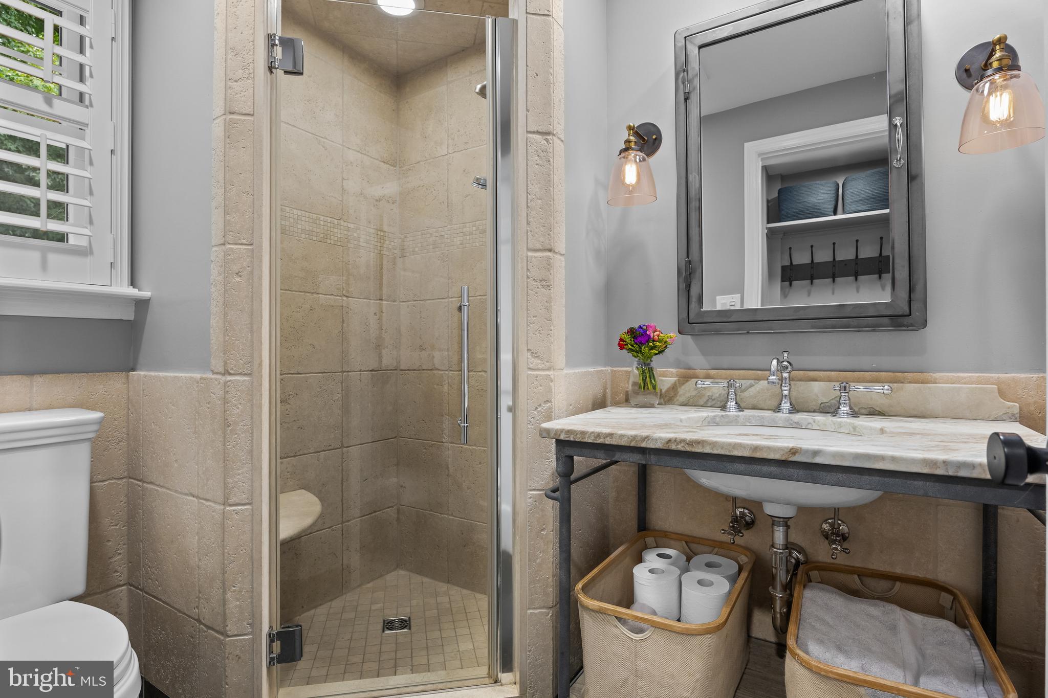 219 West Summit Avenue Haddonfield, NJ 08033 - Photo 11 of 29 a bathroom with a sink a toilet and shower