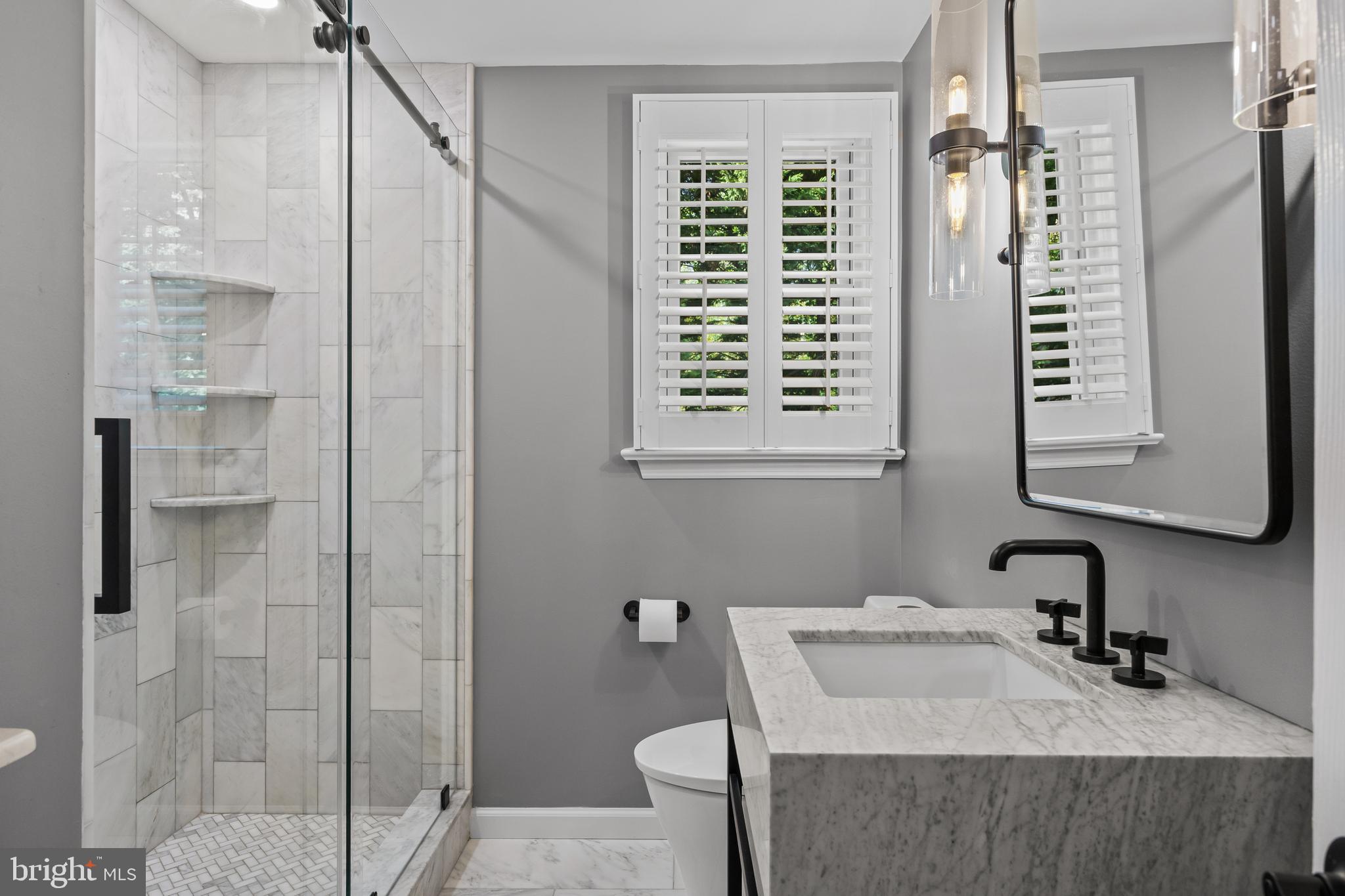 219 West Summit Avenue Haddonfield, NJ 08033 - Photo 13 of 29 a bathroom with a sink toilet and shower