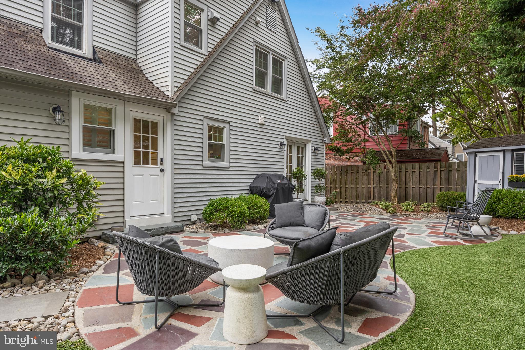 219 West Summit Avenue Haddonfield, NJ 08033 - Photo 26 of 29 a backyard of a house with table and chairs
