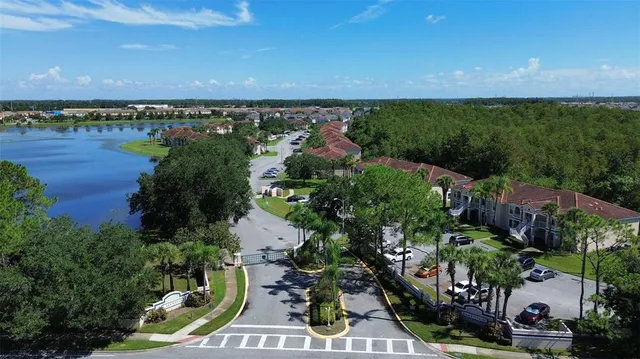 an aerial view of a city and lake view