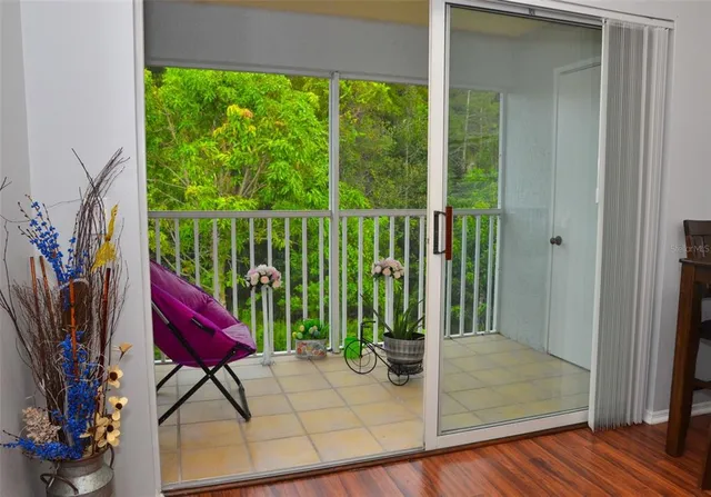 a view of a balcony with chairs