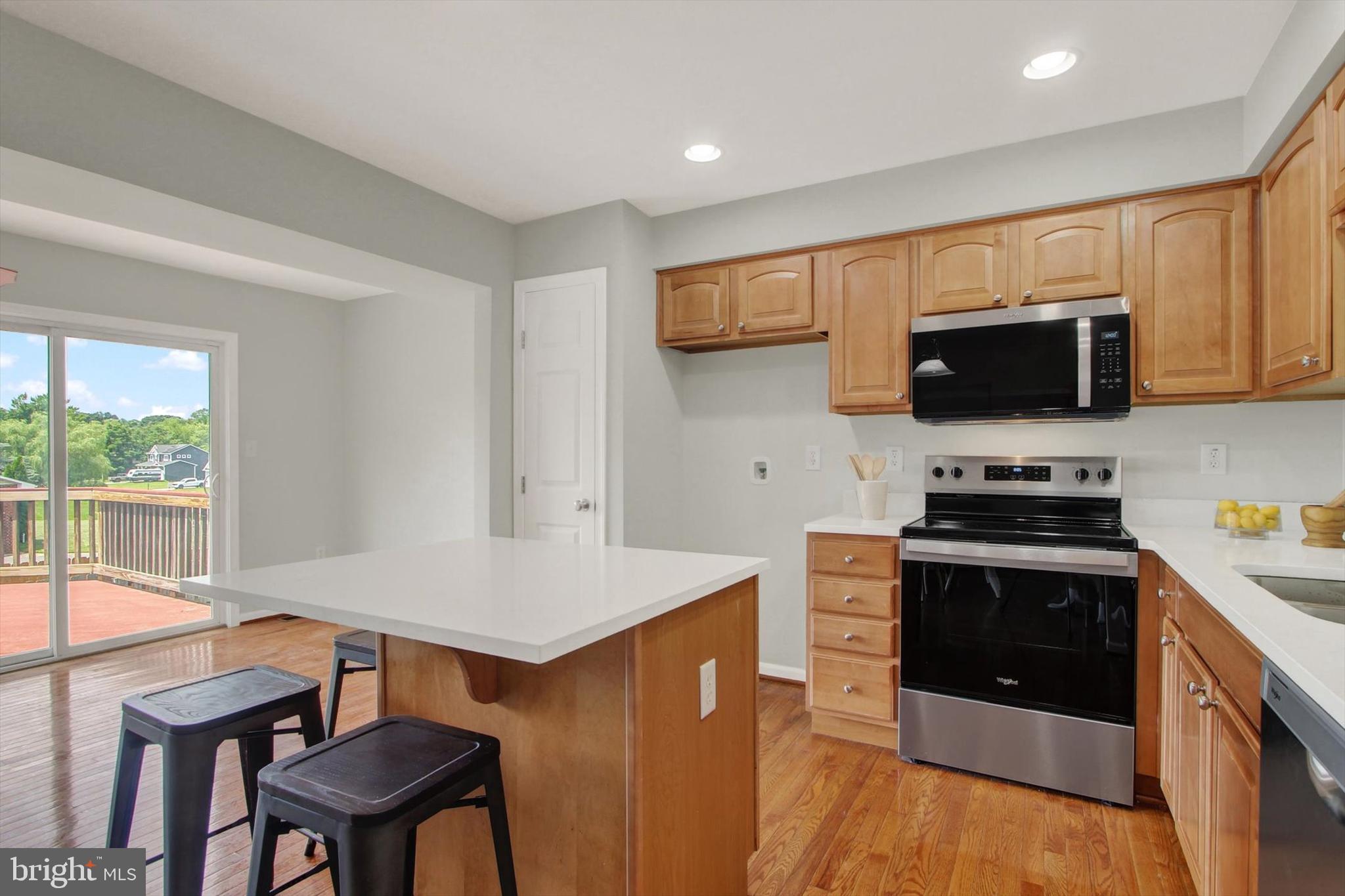 46 Forest View Terrace Hanover, PA 17331 - Photo 13 of 28 a kitchen with a stove a sink and a microwave