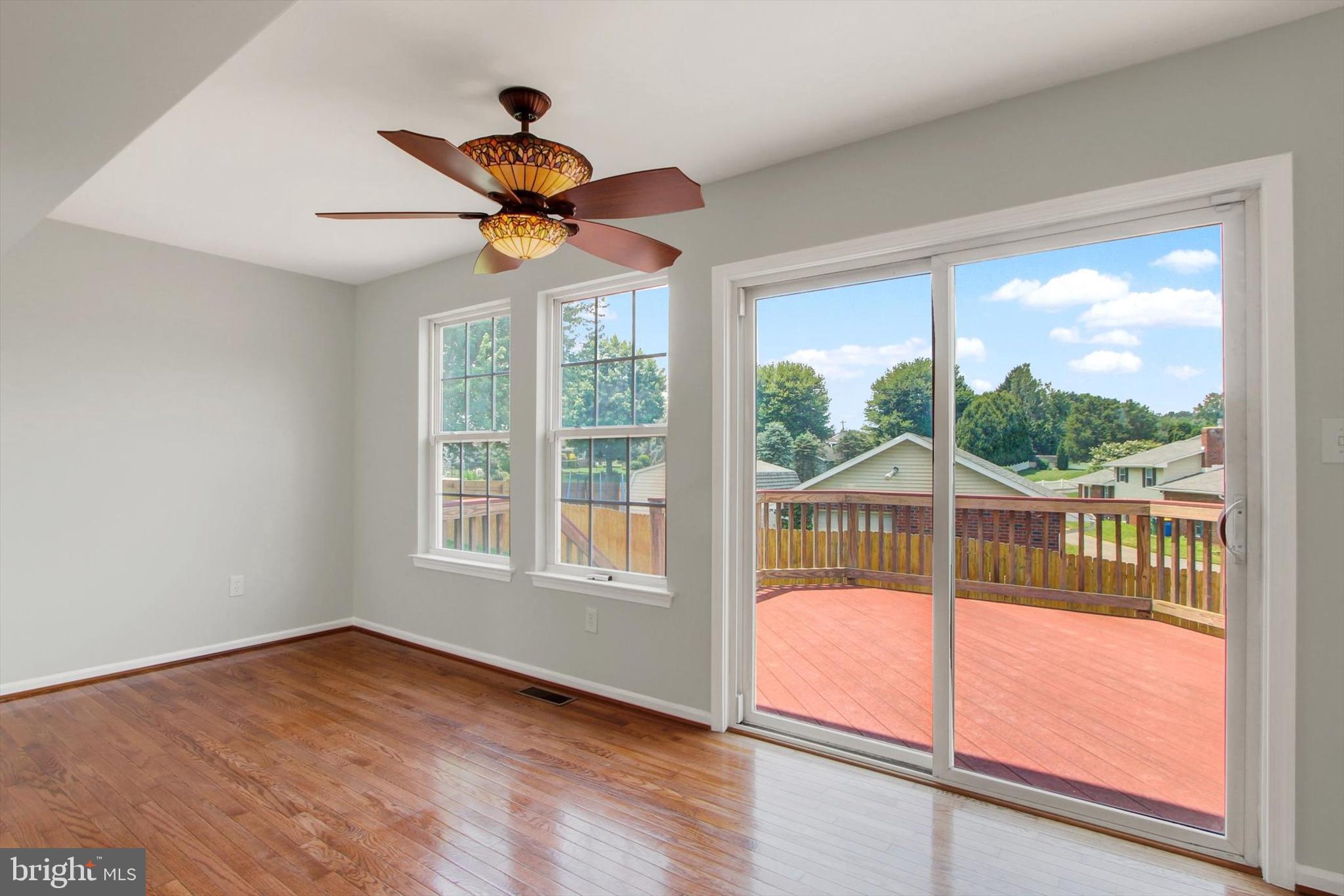 46 Forest View Terrace Hanover, PA 17331 - Photo 14 of 28 a view of empty room with wooden floor and fan