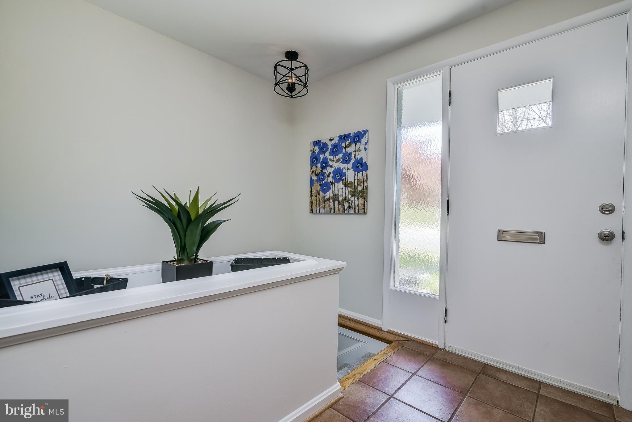 6522 East Halbert Road Bethesda, MD 20817 - Photo 29 of 63 Entry and stairs to Lower Level