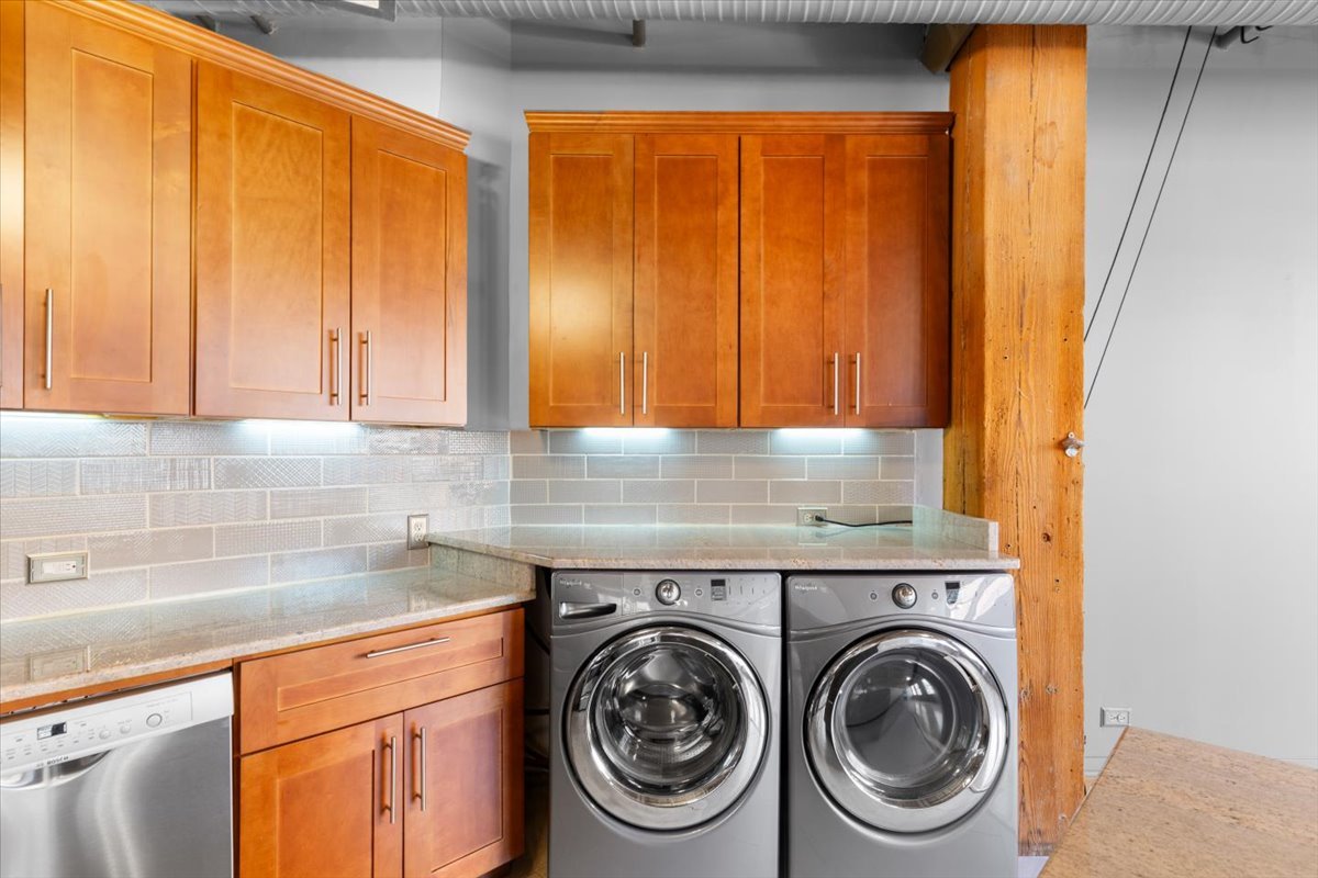 913 West Van Buren Street, Unit 4C Chicago, IL 60607 - Photo 16 of 23 a view of a kitchen with wooden floor and sink