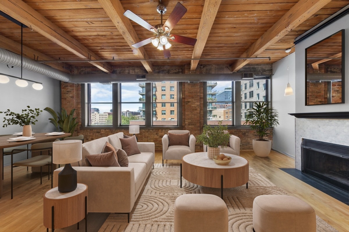 913 West Van Buren Street, Unit 4C Chicago, IL 60607 - Photo 5 of 23 a living room with furniture windows and a fireplace