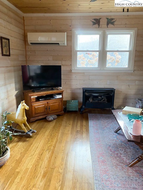 273 Walnut Branch Church Road Sparta, NC 28675 - Photo 13 of 41 a living room with furniture and a flat screen tv