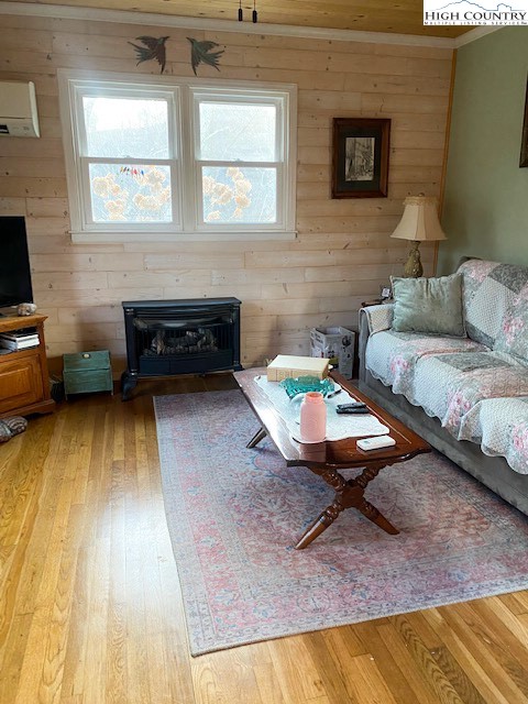 273 Walnut Branch Church Road Sparta, NC 28675 - Photo 14 of 41 a living room with furniture and a wooden floor