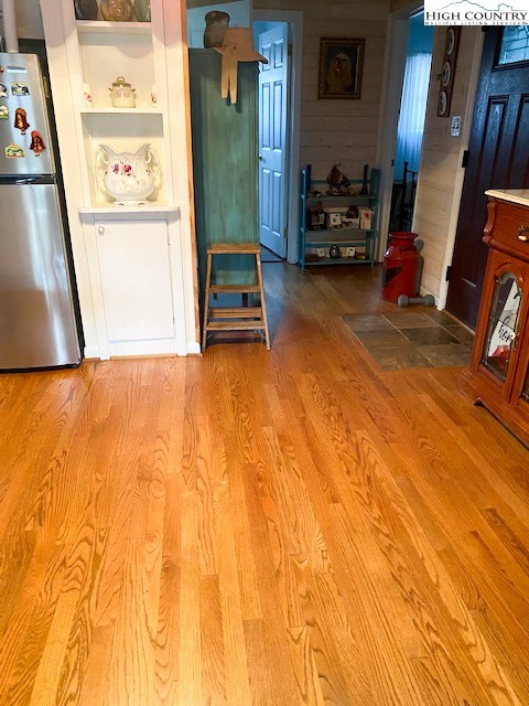273 Walnut Branch Church Road Sparta, NC 28675 - Photo 19 of 41 a view of a room with wooden floor and furniture