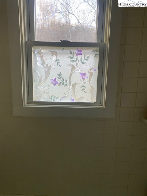 273 Walnut Branch Church Road Sparta, NC 28675 - Photo 20 of 41 a close up view of a wall painting on the wall