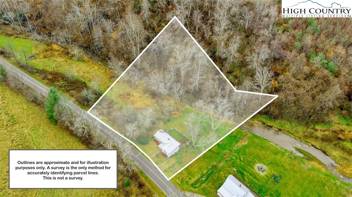 273 Walnut Branch Church Road Sparta, NC 28675 - Photo 40 of 41 a black and white photo of a house