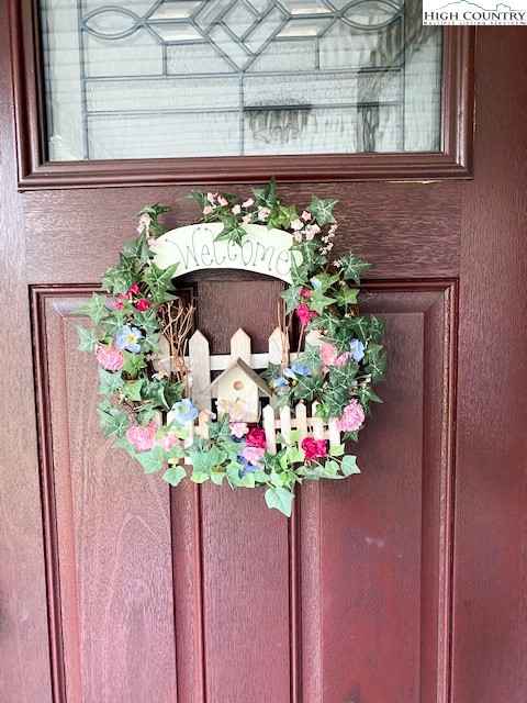 273 Walnut Branch Church Road Sparta, NC 28675 - Photo 6 of 41 a vase of flowers sitting on a shelf
