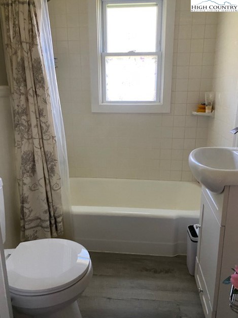 273 Walnut Branch Church Road Sparta, NC 28675 - Photo 8 of 41 a bathroom with a toilet and a bathtub