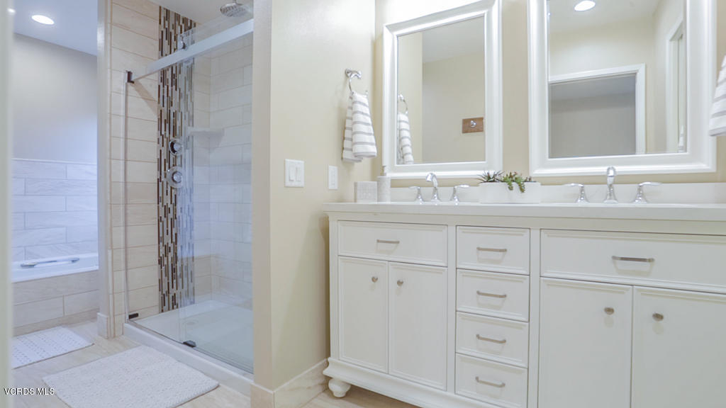 3774 Groves Place Somis, CA 93066 - Photo 17 of 51 a bathroom with a double vanity sink mirror and shower
