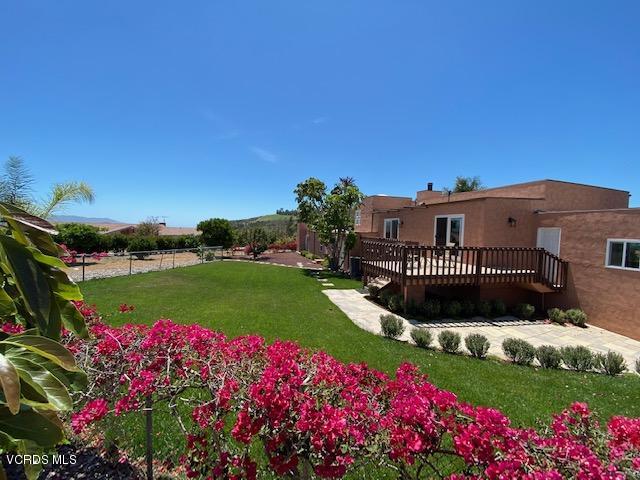 3774 Groves Place Somis, CA 93066 - Photo 28 of 51 a view of a garden with an ocean and house in the background